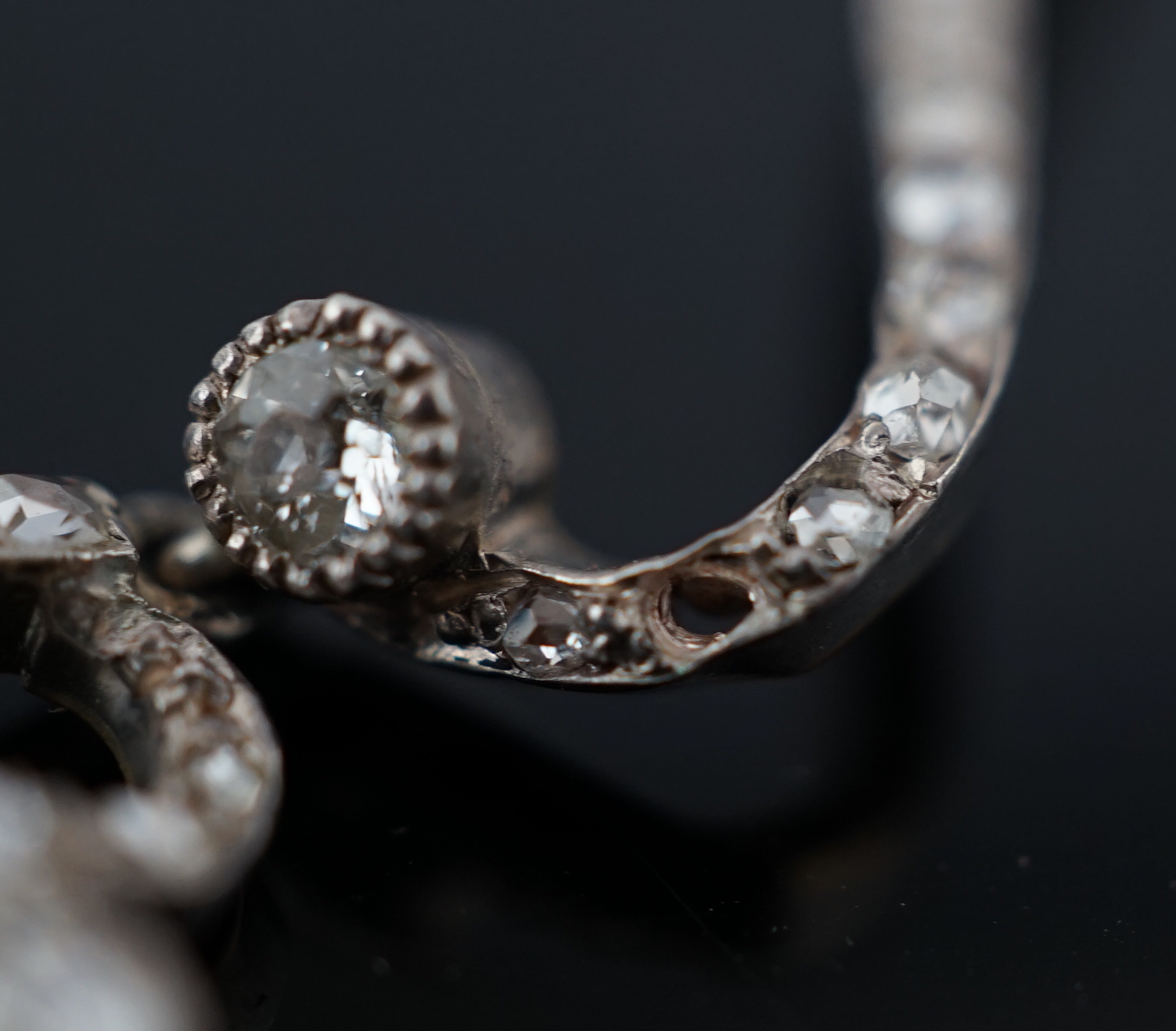 A Belle Epoque gold and silver, round and rose cut diamond cluster set pendant necklace